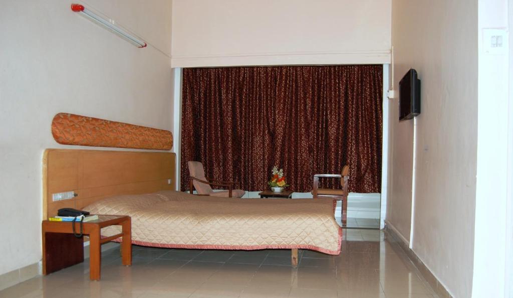 Hotel Raviraj Πούνε Δωμάτιο φωτογραφία