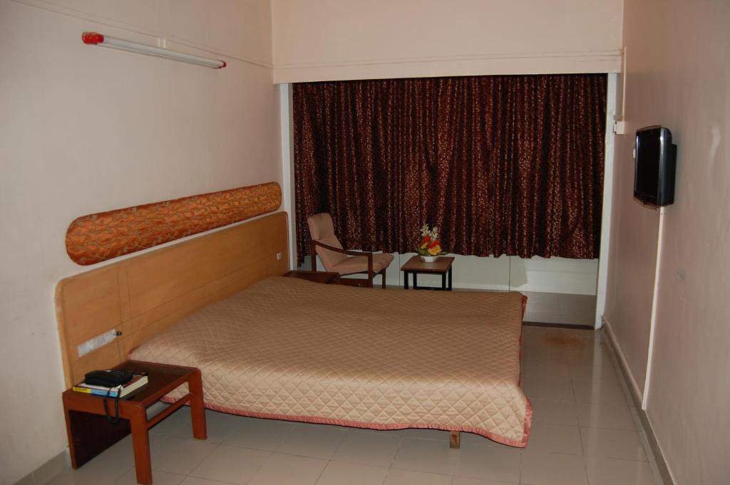 Hotel Raviraj Πούνε Δωμάτιο φωτογραφία