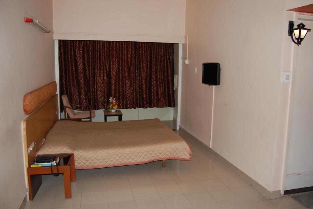 Hotel Raviraj Πούνε Δωμάτιο φωτογραφία